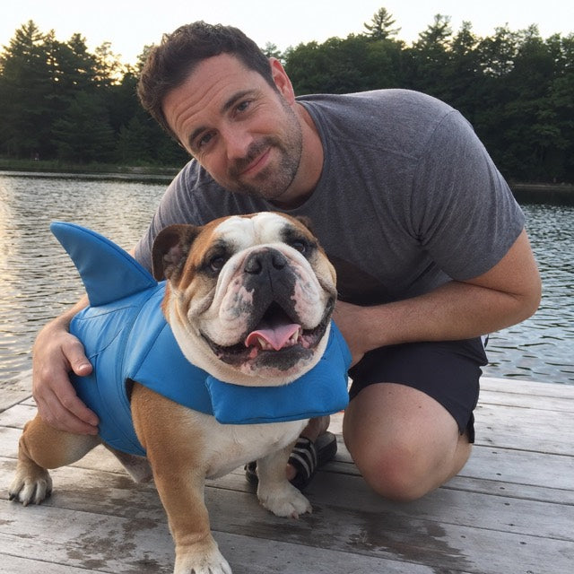 Jason with his bulldog wearing PupFin